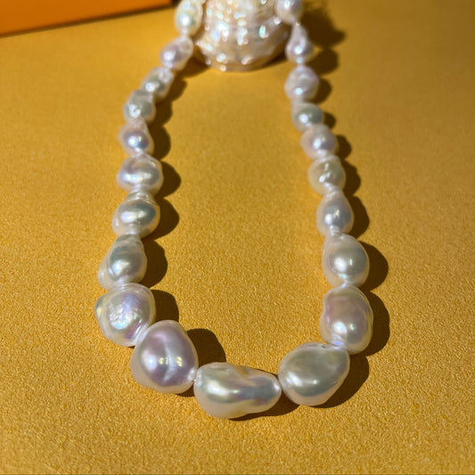Baroque Pearl necklace on a yellow background